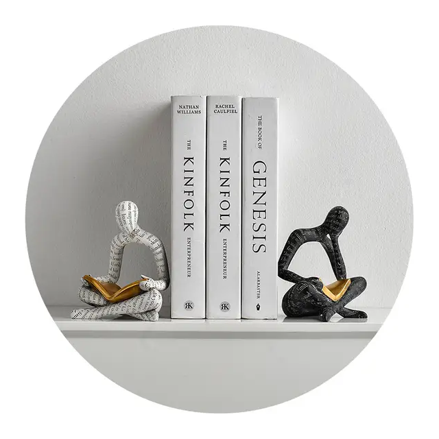 Men Reading Sculpture
