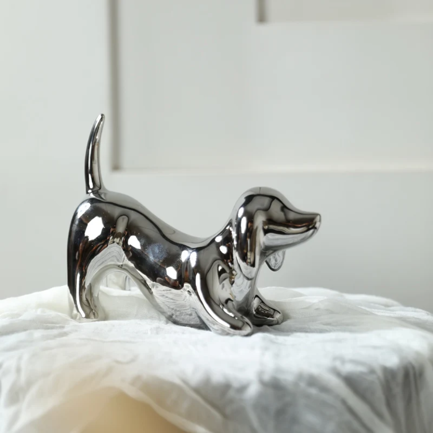 CERAMIC BENT DOG FIGURE 19.7*16 cm
